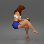 Relaxed woman sips morning coffee wearing summer top and shorts 1-24 - Only-Games