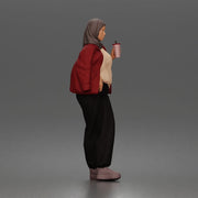 hijabi woman sipping takeaway drink in modern casual streetwear style - Only-Games