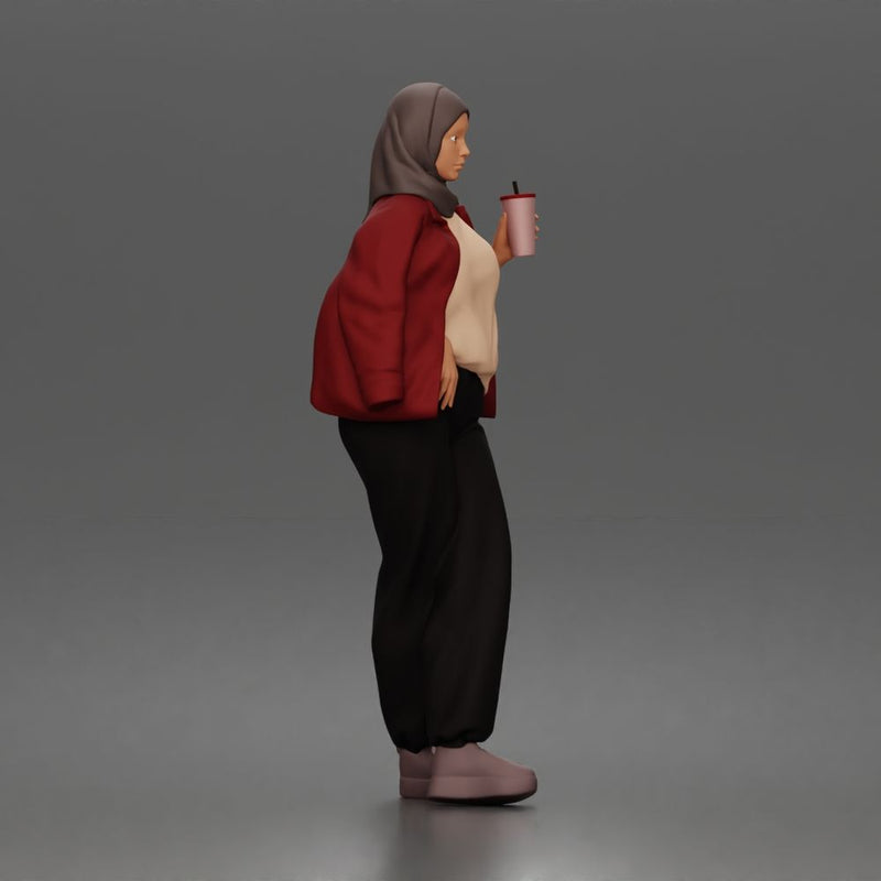 hijabi woman sipping takeaway drink in modern casual streetwear style - Only-Games