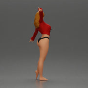 Golden dancer spins gracefully wearing red top and black bikini - Only-Games