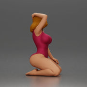 Woman in red swimsuit posing gracefully on her knees on the beach - Only-Games