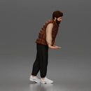 Stylish gentleman in puffer vest layered shirt joggers and sneakers
