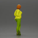 Confident woman leaning slightly with her hands in pockets - Only-Games