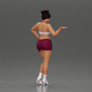 Woman striking a playful pose with one hand lifted - Only-Games