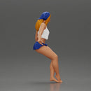 Stylish woman sitting casually in a white top and blue skirt - Only-Games