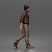 Urban explorer walking confidently in beanie jacket fitted pants and boots - Only-Games