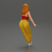 Woman sitting on car in red top yellow pants striking playful pose - Only-Games
