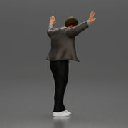Man in Stylish Jacket and Sneakers Leaning Against the Wall - Only-Games