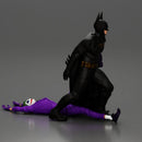 Batman dragging Joker by leg after defeating him in battle - Only-Games