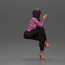 Stylish woman sitting in purple jacket posing with a cigarette confidently - Only-Games