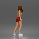 Trendy Woman Standing Confidently in Beanie, Crop Top, and Shorts