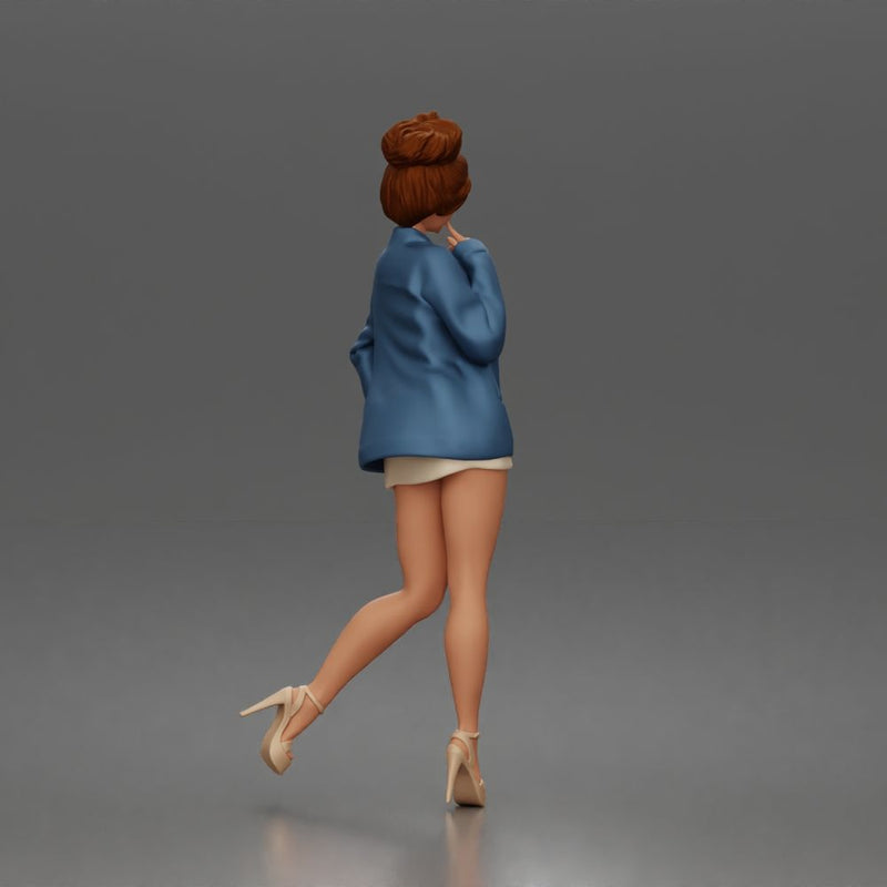 Elegant Woman Posing Confidently in Chic Jacket and Dress Outfit
