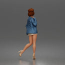 Elegant Woman Posing Confidently in Chic Jacket and Dress Outfit