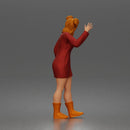 Cheerful Girl Waving Confidently in Stylish Dress and Boots