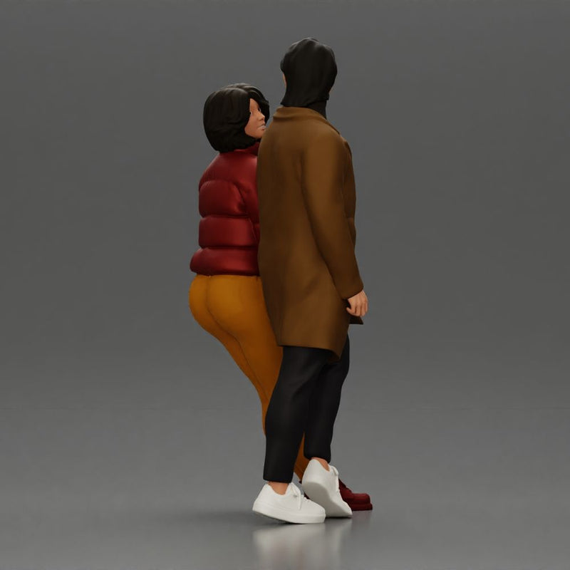 Couple in winter outfits stands by car, calm and stylish. - Only-Games