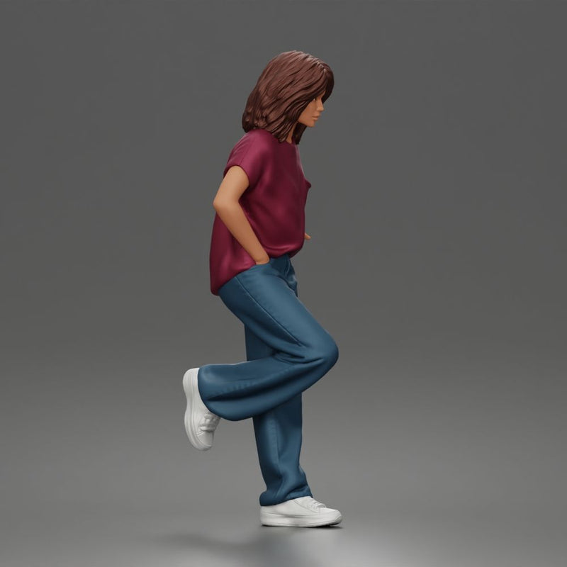 Girl Leaning posing against wall in pocket tee and denim