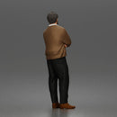 Man Standing Calmly in Casual Cardigan and Dress Pants