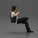 Man in a black beanie sitting and smoking a cigar - Only-Games