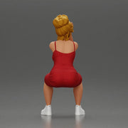 Stylish woman in red dress and sneakers striking dynamic pose - Only-Games