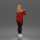 woman pointing upward wearing off shoulder shirt leggings sneakers