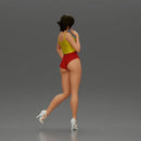 Striking a flirty pose wearing yellow crop top red bottoms - Only-Games