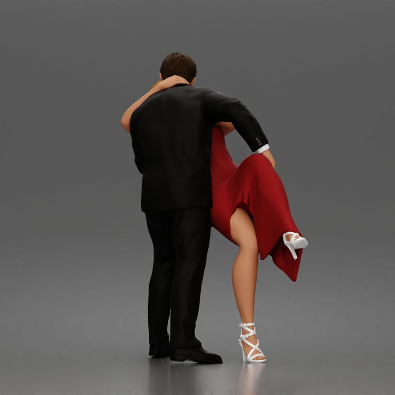 Man Dips Woman While Kissing Suit Long Dress Strappy Heels - Only-Games