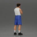 Thoughtful man stands in athletic gear pondering ideas with calm steady focus - Only-Games