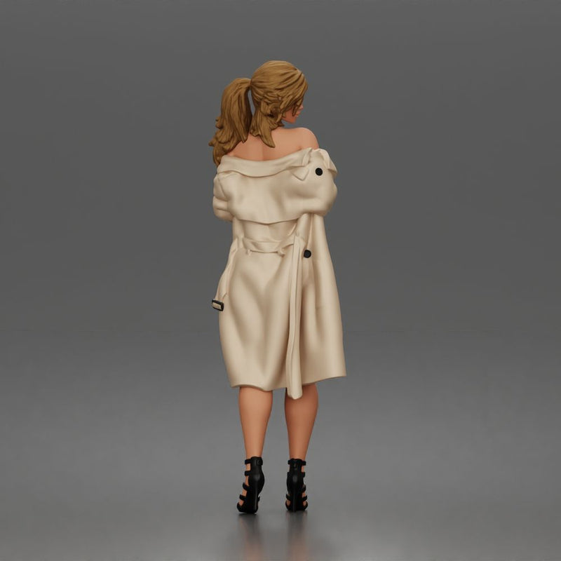 Woman Posing In Strapless Bodysuit With Long Coat And High Heel Sandals