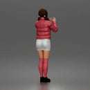 woman In Puffer Jacket With Mini Skirt Thigh-Highs And Boots
