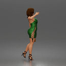 Elegant Woman Walking Confidently in Glamorous Dress, Heels, and Handbag