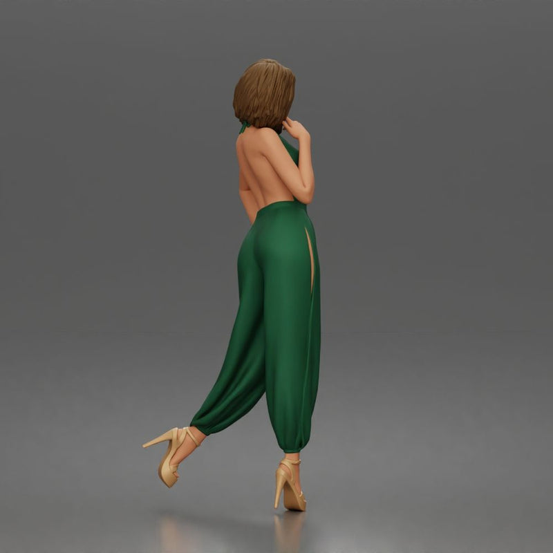 Woman poses thoughtfully lifting heel wearing halter jumpsuit with platform heels - Only-Games