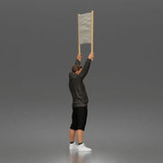 Casual protester holding blank banner wearing hoodie shorts and sneakers - Only-Games