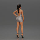 Woman in silver mini dress posing with hand on hip - Only-Games