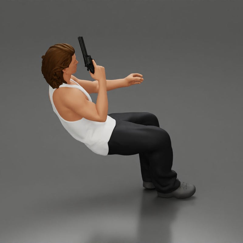Man sitting with gun in hand pointing forward calmly - Only-Games