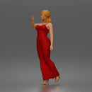Elegant woman in sleeveless evening dress with side slit