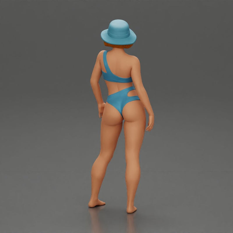 Stylish woman modeling modern asymmetric bikini and hat - Only-Games