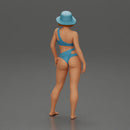 Stylish woman modeling modern asymmetric bikini and hat - Only-Games