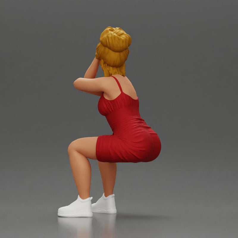 Stylish woman in red dress and sneakers striking dynamic pose - Only-Games