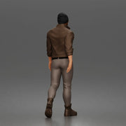 Urban explorer walking confidently in beanie jacket fitted pants and boots - Only-Games
