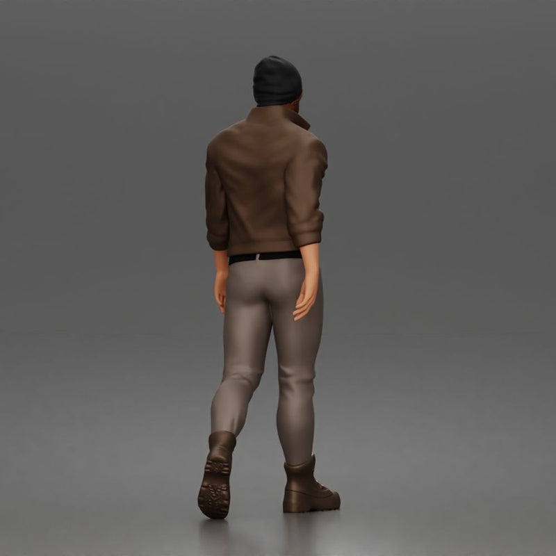 Urban explorer walking confidently in beanie jacket fitted pants and boots - Only-Games