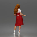 Woman standing In Belted Pinafore Dress Over Blouse With Heeled Sandals