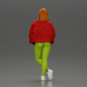 woman standing stylishly hands in pockets striking pose - Only-Games