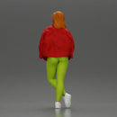 woman standing stylishly hands in pockets striking pose - Only-Games