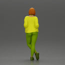 Confident woman leaning slightly with her hands in pockets - Only-Games