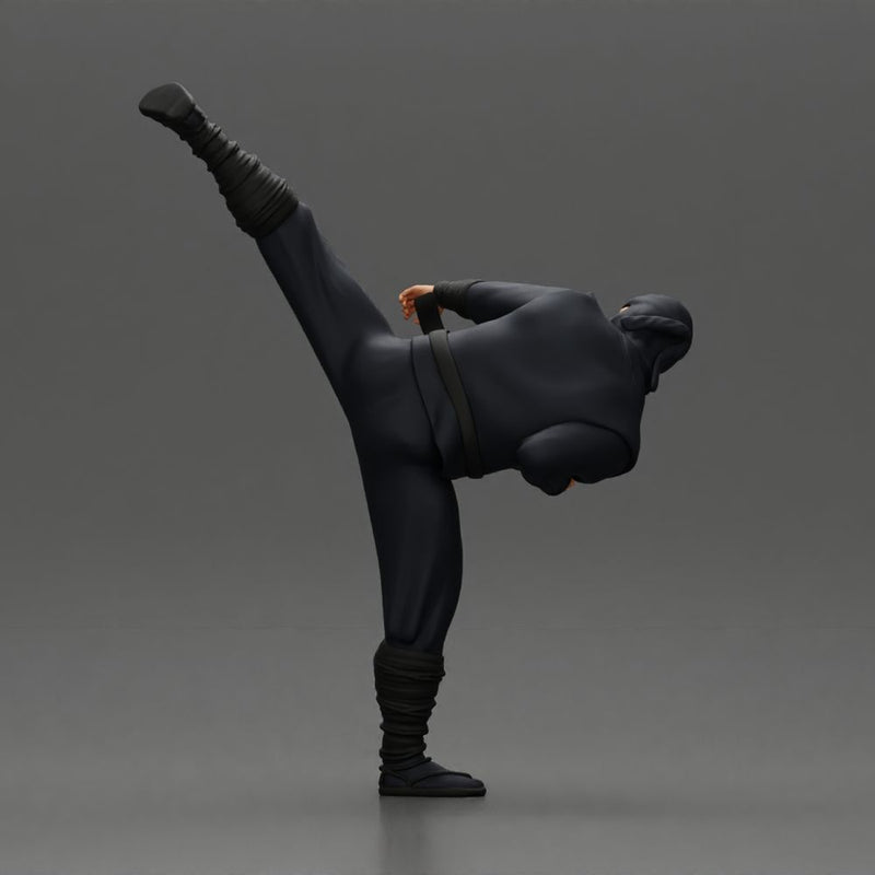 Ninja in black uniform performs high side kick with precision - Only-Games