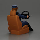 Focused officer in blue uniform driving seated holding steering wheel - Only-Games