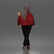 hijabi woman sipping takeaway drink in modern casual streetwear style - Only-Games