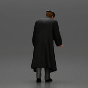 Man in black coat wearing flat cap standing with serious expression - Only-Games