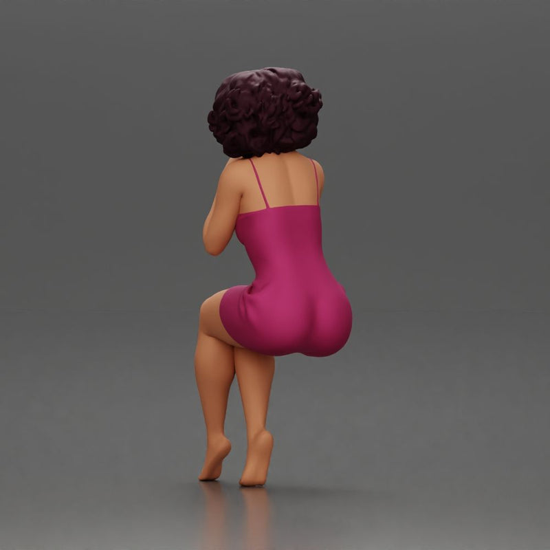Woman in Pink Dress Sitting with Hands on Chin - Only-Games