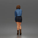 Stylish Woman Standing Gracefully Wearing Jacket Skirt And Boots